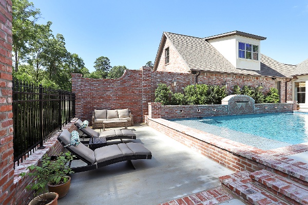 Shaded chaise area next to pool