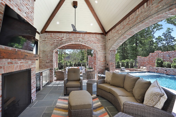 Lounging area next to residence swimming pool