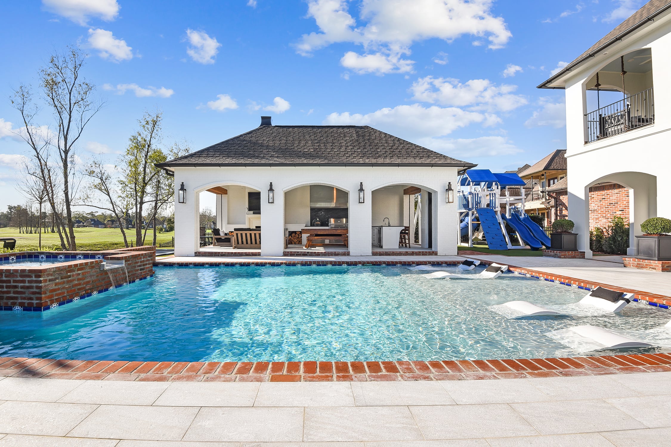 Pool with Outdoor Kitchen in Baton Rouge | Custom Pools Denham Springs