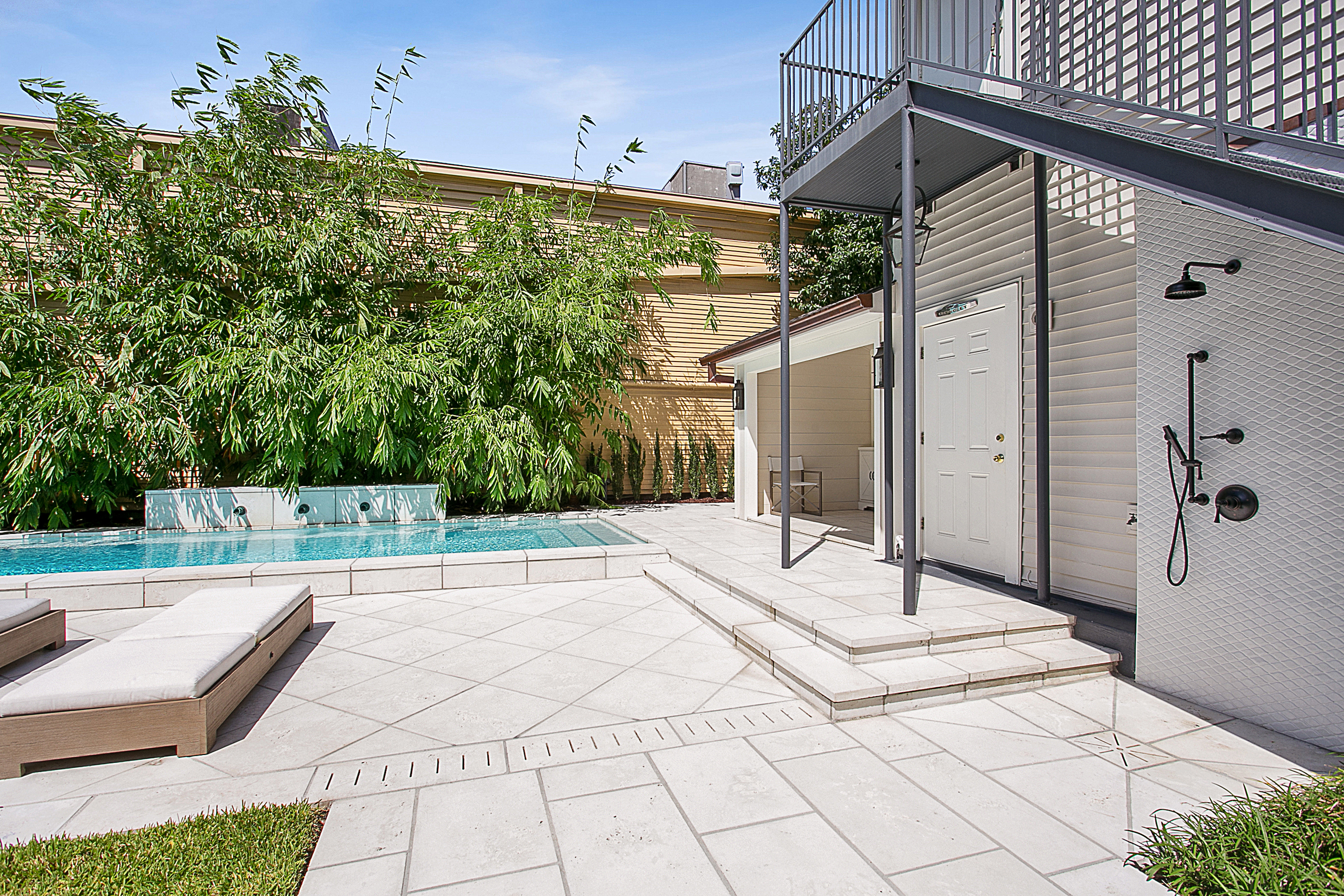 Cocktail pool new orleans with wetedge plaster and firerock pavers